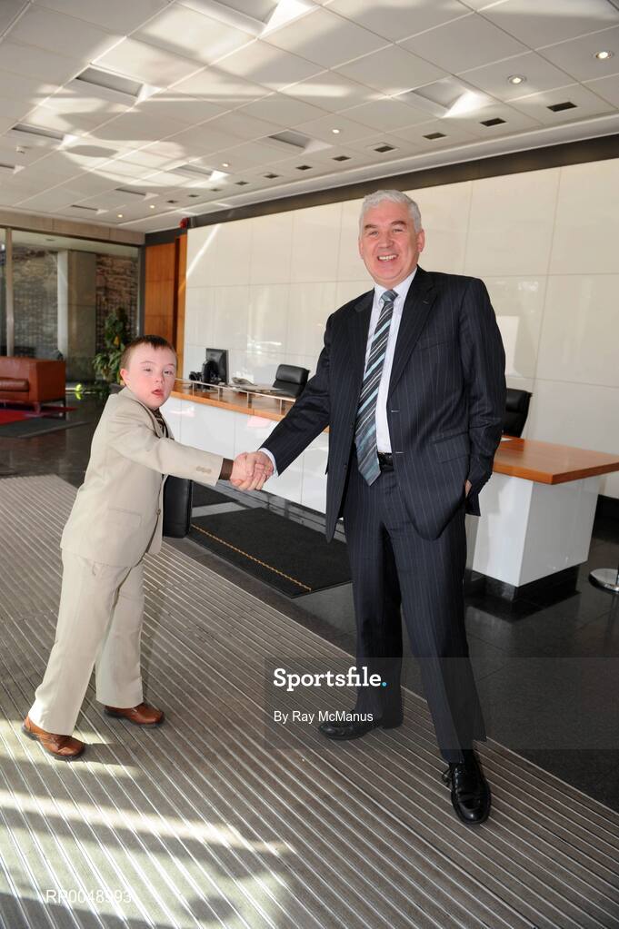 12 March 2008; Ten-year-old Special Olympics athlete Josh Hennessy, from Speisialta Special Olympics Club, Clondalkin, 'seals the deal' with Cathal Magee, Managing Director, eircom Retail, at the announcement that eircom has renewed its sponsorship of Special Olympics Ireland for another four years. eircom offices, St. Stephen's Green, Dublin. Picture credit: Ray McManus / SPORTSFILE
