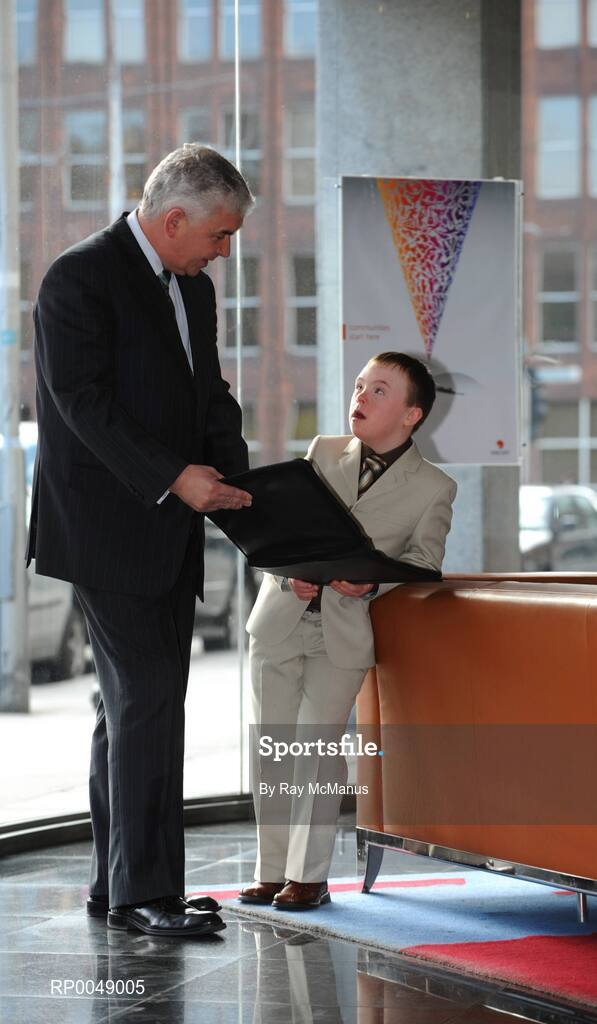 12 March 2008; Ten-year-old Special Olympics athlete Josh Hennessy, from Speisialta Special Olympics Club, Clondalkin, 'seals the deal' with Cathal Magee, Managing Director, eircom Retail, at the announcement that eircom has renewed its sponsorship of Special Olympics Ireland for another four years. eircom offices, St. Stephen's Green, Dublin. Picture credit: Ray McManus / SPORTSFILE