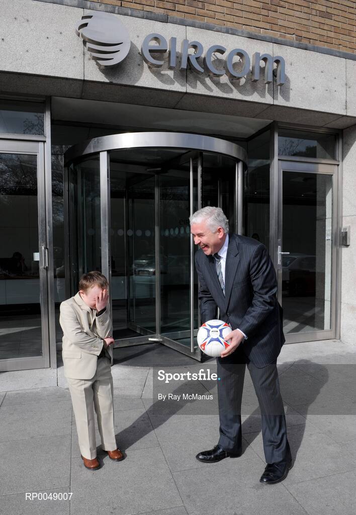 12 March 2008; Ten-year-old Special Olympics athlete Josh Hennessy, from Speisialta Special Olympics Club, Clondalkin, 'seals the deal' with Cathal Magee, Managing Director, eircom Retail, at the announcement that eircom has renewed its sponsorship of Special Olympics Ireland for another four years. eircom offices, St. Stephen's Green, Dublin. Picture credit: Ray McManus / SPORTSFILE