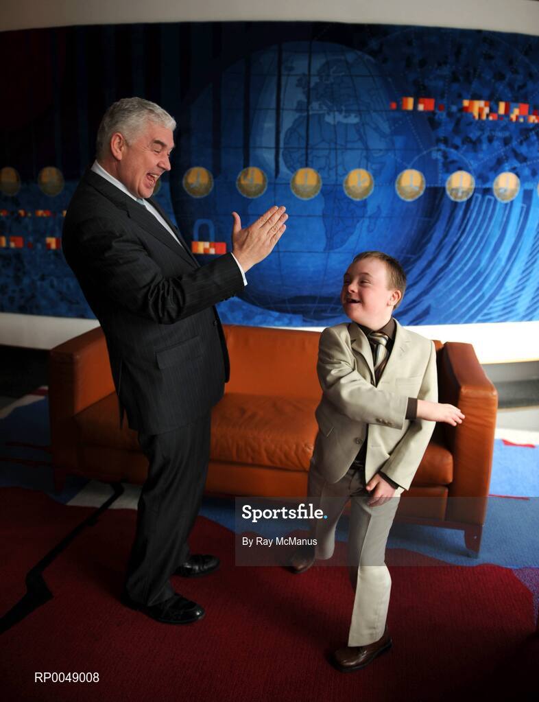 12 March 2008; Ten-year-old Special Olympics athlete Josh Hennessy, from Speisialta Special Olympics Club, Clondalkin, 'seals the deal' with Cathal Magee, Managing Director, eircom Retail, at the announcement that eircom has renewed its sponsorship of Special Olympics Ireland for another four years. eircom offices, St. Stephen's Green, Dublin. Picture credit: Ray McManus / SPORTSFILE