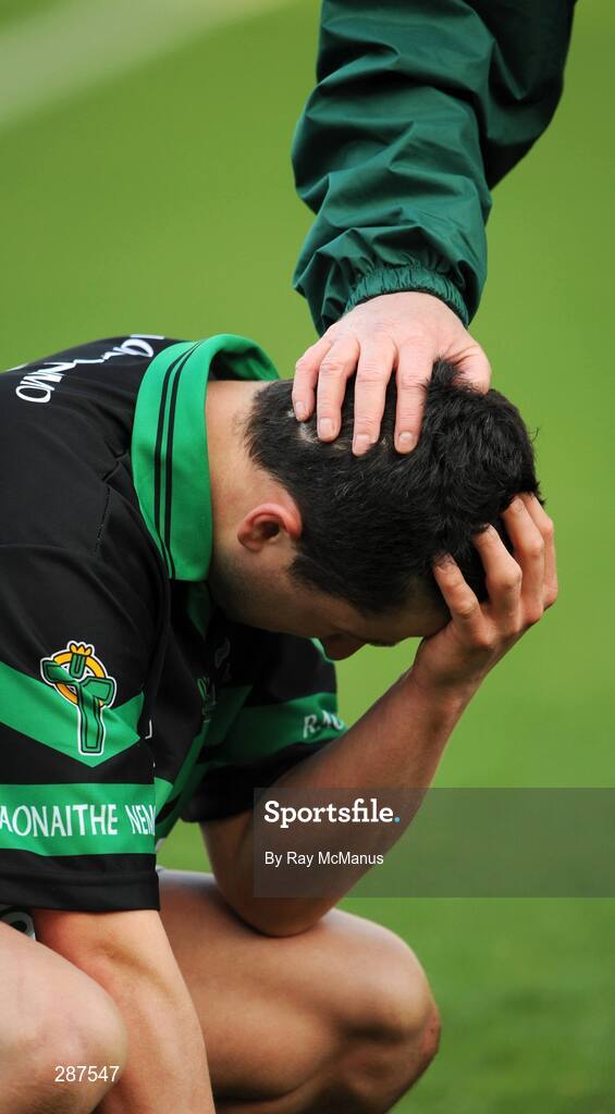 17 March 2008; Nemo Rangers' right-half-back Brian O'Regan is comforted after the game. AIB All-Ireland Club Football Final - St Vincent's v Nemo Rangers, Croke Park, Dublin. Picture credit; Ray McManus / SPORTSFILE