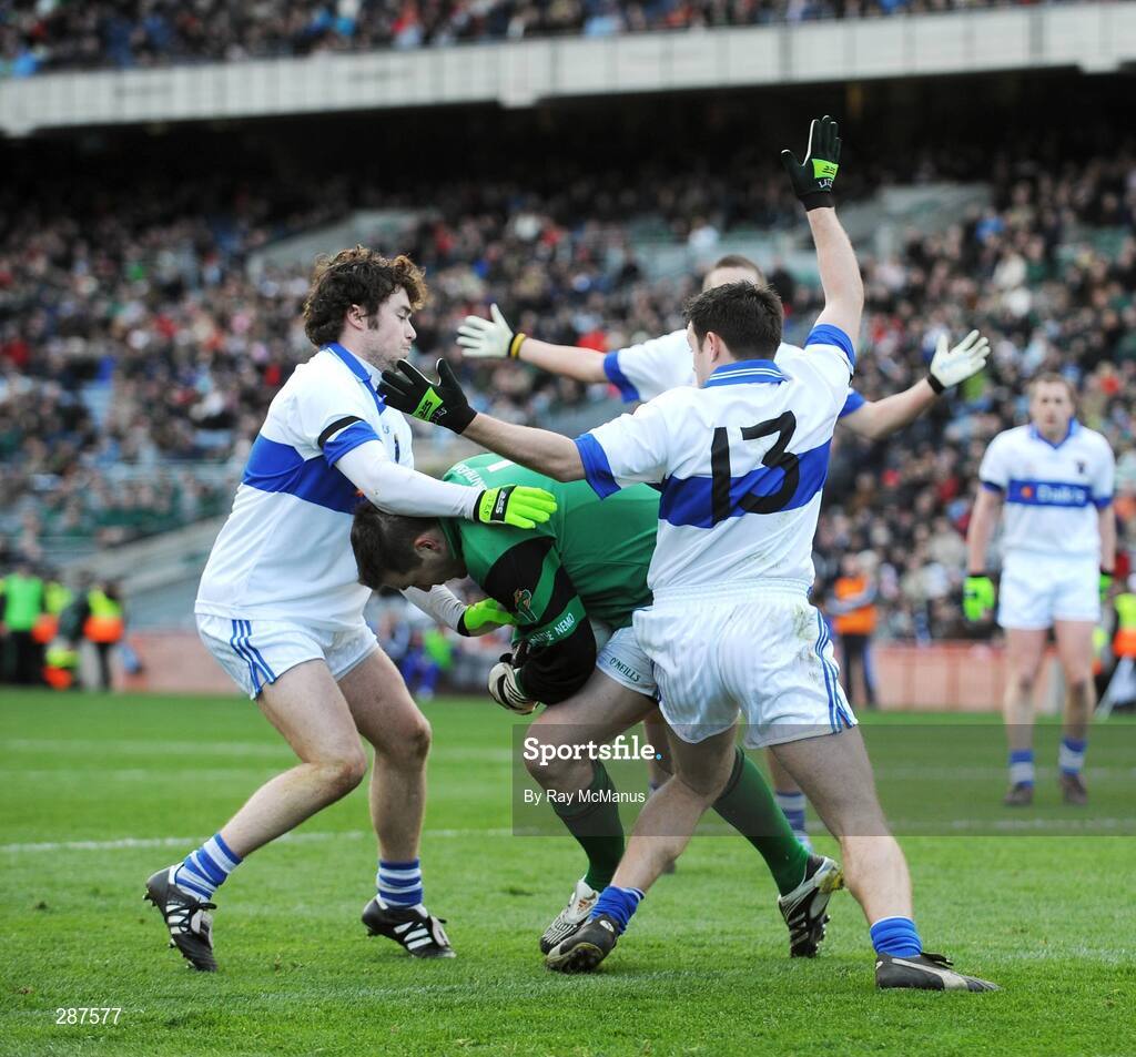 17 March 2008; Nemo Rangers' goalkeeper Brian Morgan attempts to clear under pressure from St. Vincent's players Tiernan Diamond, left, and Brian Maloney. AIB All-Ireland Club Football Final - St Vincent's v Nemo Rangers, Croke Park, Dublin. Picture credit; Ray McManus / SPORTSFILE