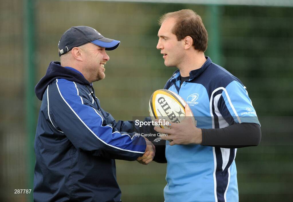 19 March 2008; Kurt McQuilkin, Leinster coaching team, shakes hands with Keith Gleeson during squad training ahead of their Magners League game against Glasgow Warriors on Friday night. Leinster rugby squad training, Belfield, UCD, Dublin. Picture credit: Caroline Quinn / SPORTSFILE
