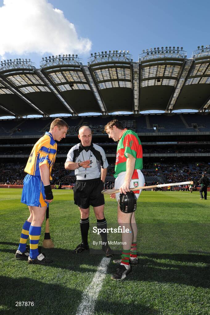 17 March 2008; Portumna captain Ollie Canning, left, and Birr captain Brian Whelahan look on as referee John Sexton tosses the coin before the game. AIB All-Ireland Club Hurling Final, Portumna v Birr, Croke Park, Dublin. Picture credit; Ray McManus / SPORTSFILE