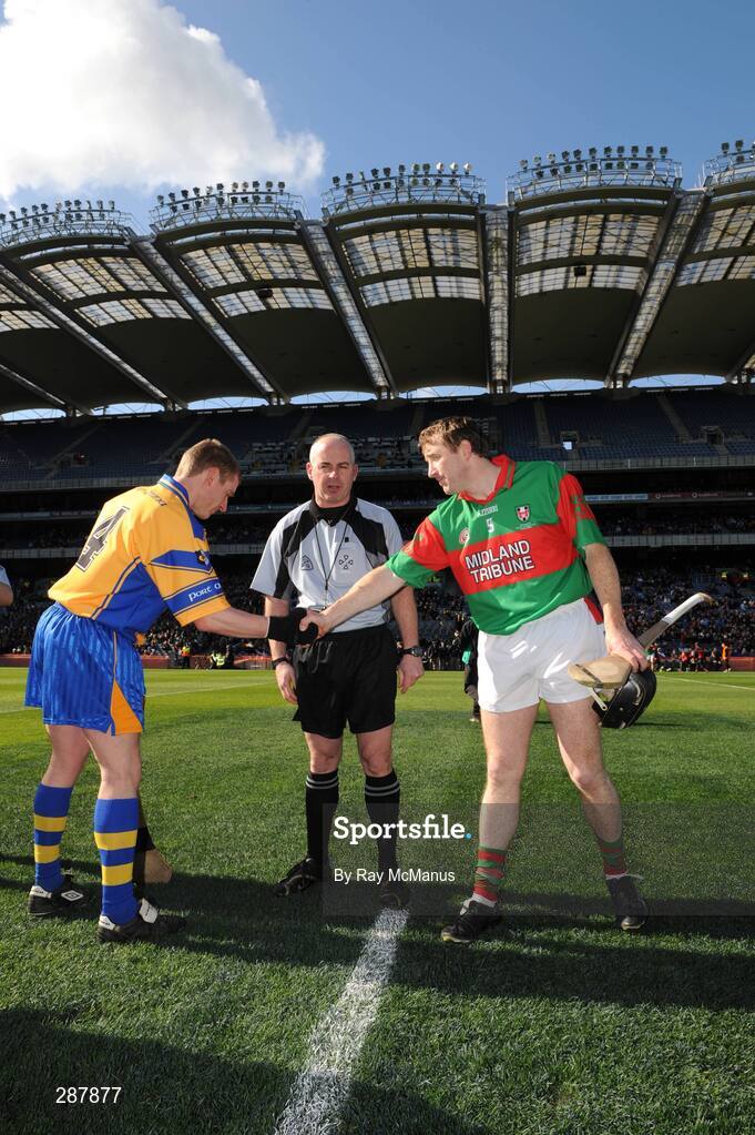 17 March 2008; Portumna captain Ollie Canning, left, and Birr captain Brian Whelahan shake hands in front of referee John Sexton before the game. AIB All-Ireland Club Hurling Final, Portumna v Birr, Croke Park, Dublin. Picture credit; Ray McManus / SPORTSFILE