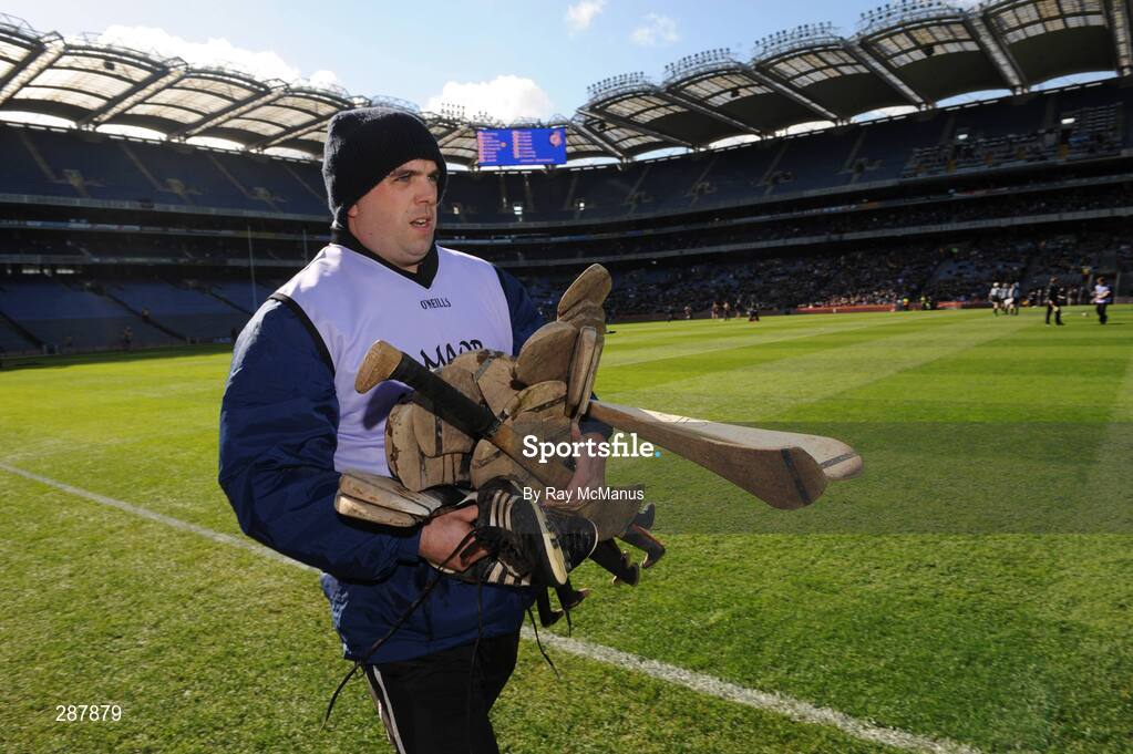 17 March 2008; A Portumna official carries spare hurleys and boots. AIB All-Ireland Club Hurling Final, Portumna v Birr, Croke Park, Dublin. Picture credit; Ray McManus / SPORTSFILE