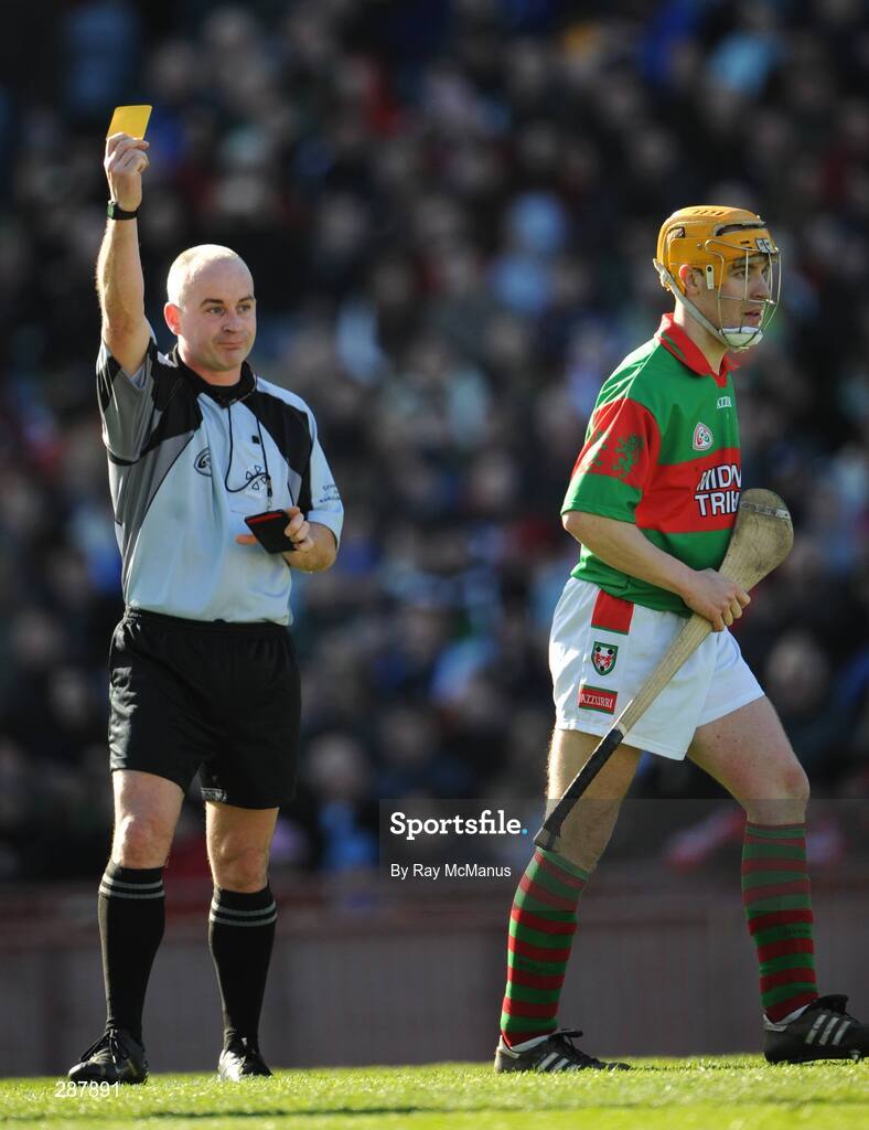 17 March 2008; Referee John Sexton shows a yellow card to Niall Claffey, Birr. AIB All-Ireland Club Hurling Final, Portumna v Birr, Croke Park, Dublin. Picture credit; Ray McManus / SPORTSFILE