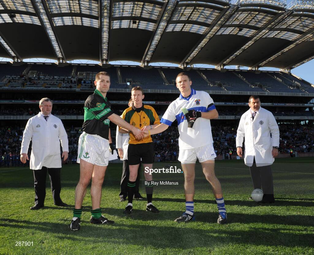 17 March 2008; Nemo Rangers captain Niall Geary, left, and St Vincents captain Tomas Quinn shake hands in front of referee Joe McQuillan. AIB All-Ireland Club Football Final, St Vincents v Nemo Rangers, Croke Park, Dublin. Picture credit; Ray McManus / SPORTSFILE