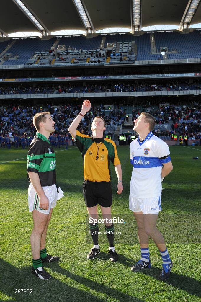 17 March 2008; Nemo Rangers captain Niall Geary, left, and St Vincents captain Tomas Quinn look on as referee Joe McQuillan tosses the coin. AIB All-Ireland Club Football Final, St Vincents v Nemo Rangers, Croke Park, Dublin. Picture credit; Ray McManus / SPORTSFILE
