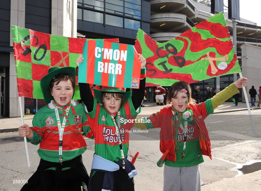 17 March 2008; Birr supporters Aoibhe, left, and Brooke, right, daughters of team captain Brian Whelahan, with Brendan Beale, centre, cheer on their team before the game. AIB All-Ireland Club Hurling Final - Portumna v Birr, Croke Park, Dublin. Picture credit; Ray McManus / SPORTSFILE