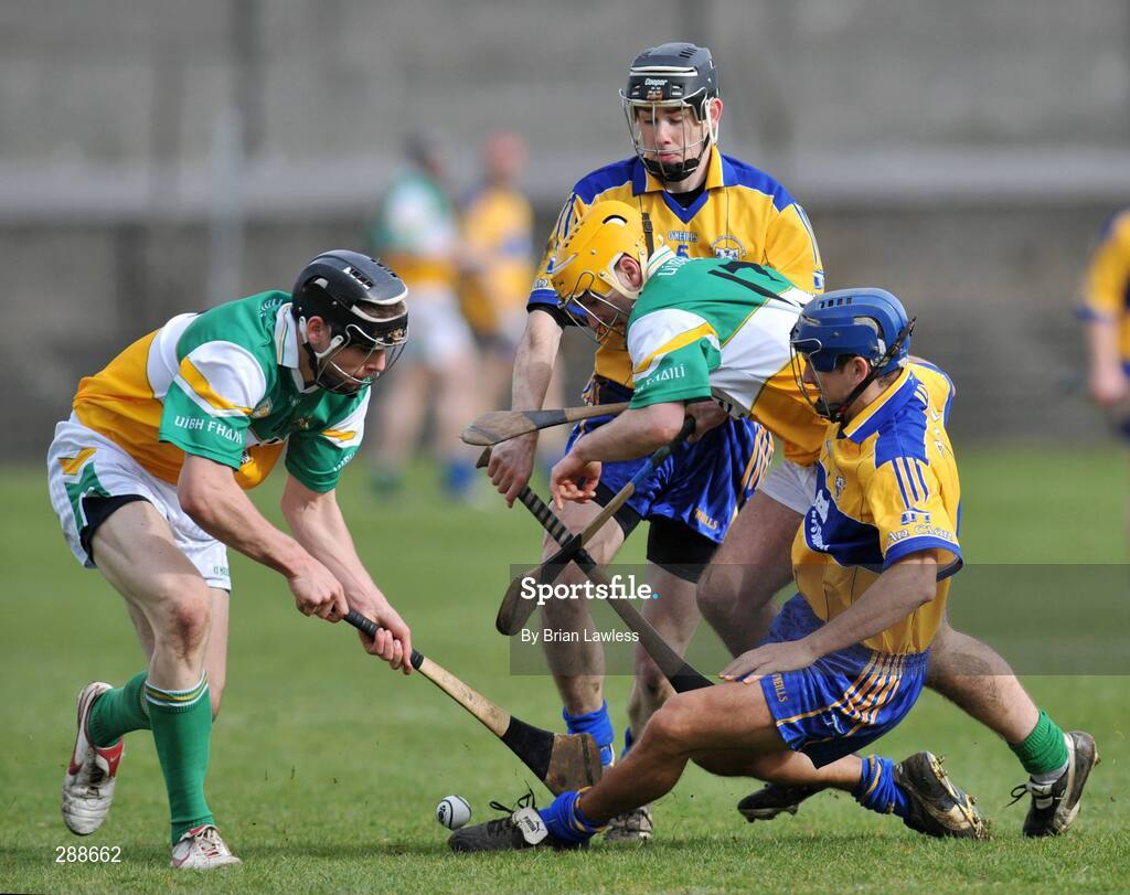 23 March 2008; Brian Carroll and Conor Mahon, left, Offaly, in action against Gerry O'Grady, right, and Pat Donlon, Clare. Allianz National Hurling League, Division 1A, Round 5, Offaly v Clare, O'Connor Park, Tullamore, Co. Offaly. Picture credit; Brian Lawless / SPORTSFILE