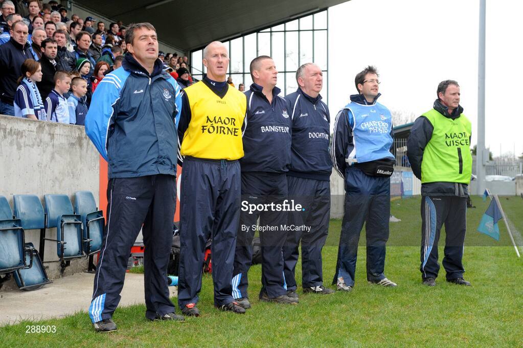 23 March 2008; Dublin manager Paul Caffrey, third from left, stands for  Amhrán na bhFiann with officials, from left, David Whelan, Paul Clarke, selector, Gerry McElvaney, Team Doctor, John Murphy, Chartered Physiotherapist, and Pat Burke. Allianz National Hurling League, Division 2, Round 4, Dublin v Monaghan, Parnell Park, Dublin. Picture credit; Stephen McCarthy / SPORTSFILE