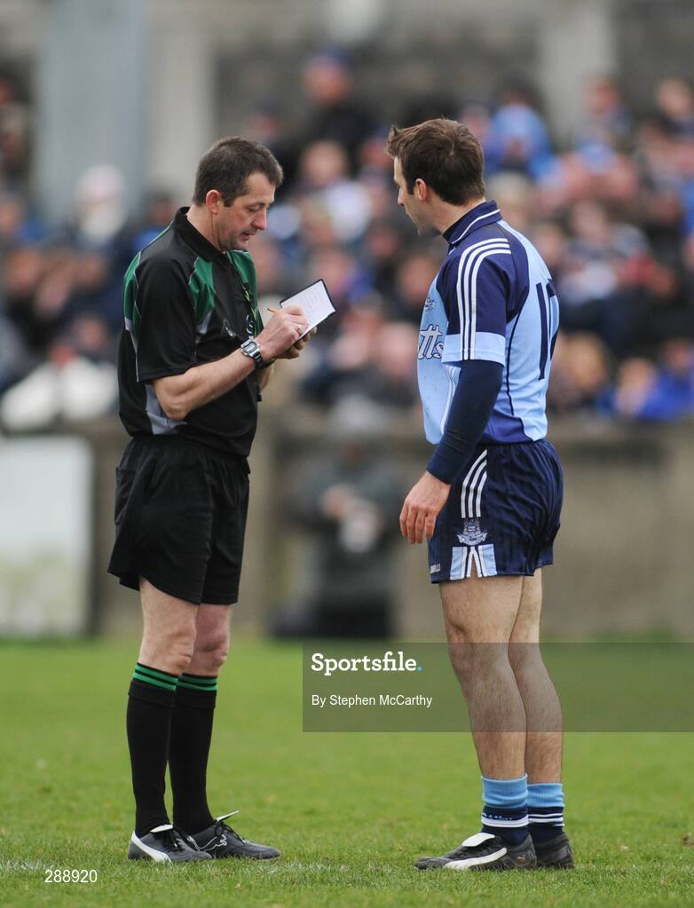 23 March 2008; Dublin's Bryan Cullen has his name taken by referee Syl Doyle. Allianz National Football League, Division 2, Round 4, Dublin v Monaghan, Parnell Park, Dublin. Picture credit; Stephen McCarthy / SPORTSFILE