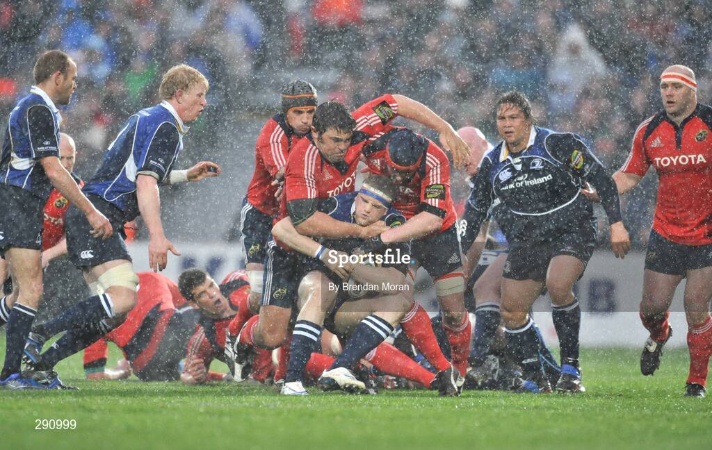 12 April 2008; Jamie Heaslip, Leinster, is tackled by Tony Buckley and Anthony Foley, Munster. Magners League, Leinster v Munster, RDS, Ballsbridge, Dublin. Picture credit: Brendan Moran / SPORTSFILE