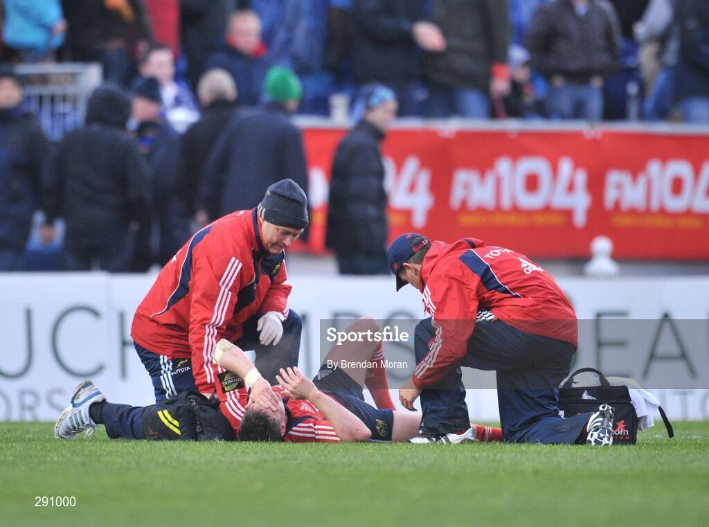 12 April 2008; Munster out-half Ronan O'Gara is attended to at half-time before leaving the pitch with a leg injury. Magners League, Leinster v Munster, RDS, Ballsbridge, Dublin. Picture credit: Brendan Moran / SPORTSFILE