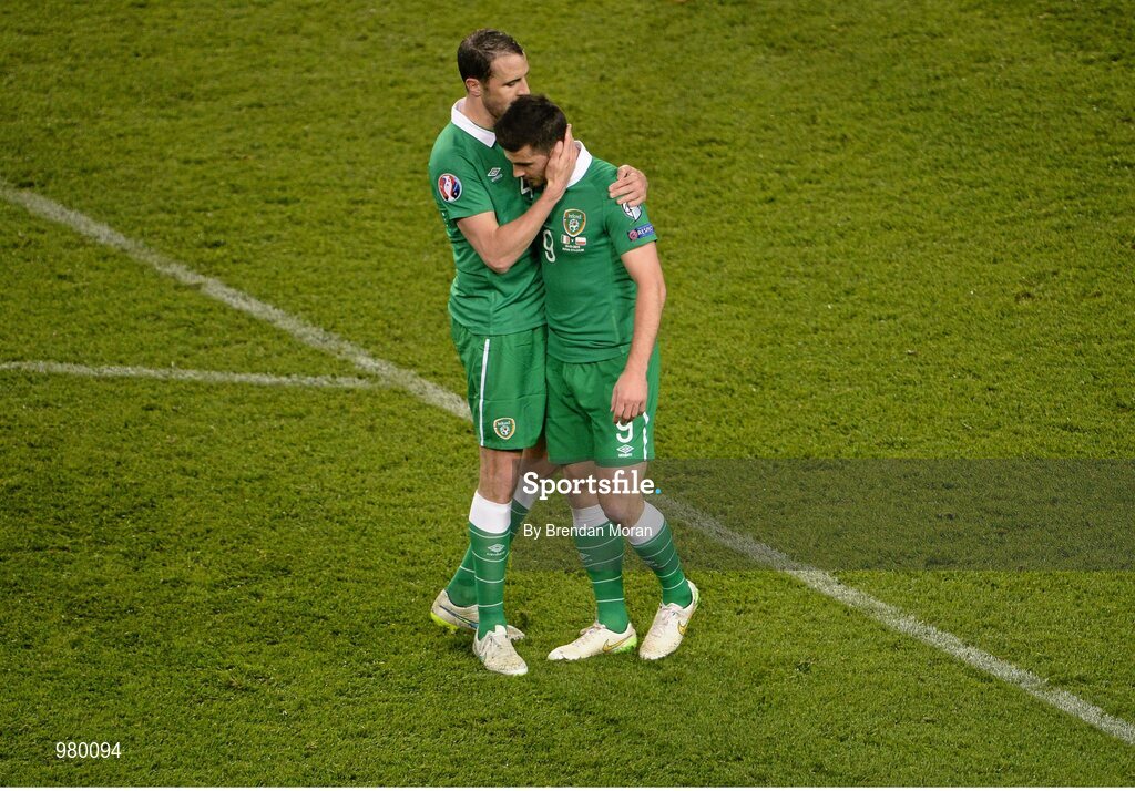 29 March 2015; Goalscorer Shane Long, right, Republic of Ireland, is congratulated by captain John O'Shea at the final whistle. UEFA EURO 2016 Championship Qualifier, Group D, Republic of Ireland v Poland. Aviva Stadium, Lansdowne Road, Dublin. Picture credit: Brendan Moran / SPORTSFILE