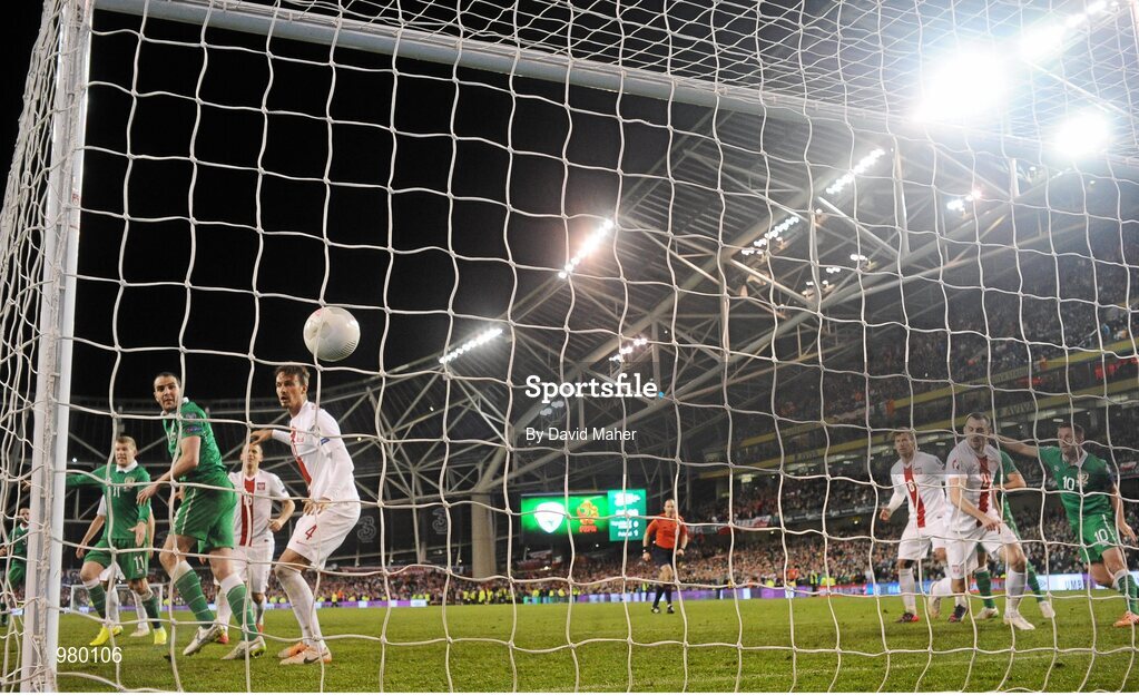 29 March 2015; Republic of Ireland's John O'Shea and Robbie Keane look on as team-mate Shane Long's shot hits to the net to score their side's equalising goal. UEFA EURO 2016 Championship Qualifier, Group D, Republic of Ireland v Poland. Aviva Stadium, Lansdowne Road, Dublin. Picture credit: David Maher / SPORTSFILE
