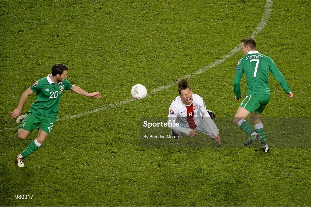 29 March 2015; Grzegorz Krychowiak, Poland, is tackled by Aiden McGeady, right, Republic of Ireland. UEFA EURO 2016 Championship Qualifier, Group D, Republic of Ireland v Poland. Aviva Stadium, Lansdowne Road, Dublin. Picture credit: Brendan Moran / SPORTSFILE