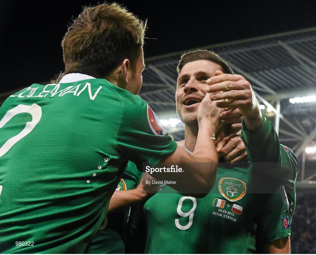 29 March 2015; Shane Long, Republic of Ireland, is congratulated by team-mate Seamus Colman, after scoring his side's equalising goal. UEFA EURO 2016 Championship Qualifier, Group D, Republic of Ireland v Poland. Aviva Stadium, Lansdowne Road, Dublin. Picture credit: David Maher / SPORTSFILE