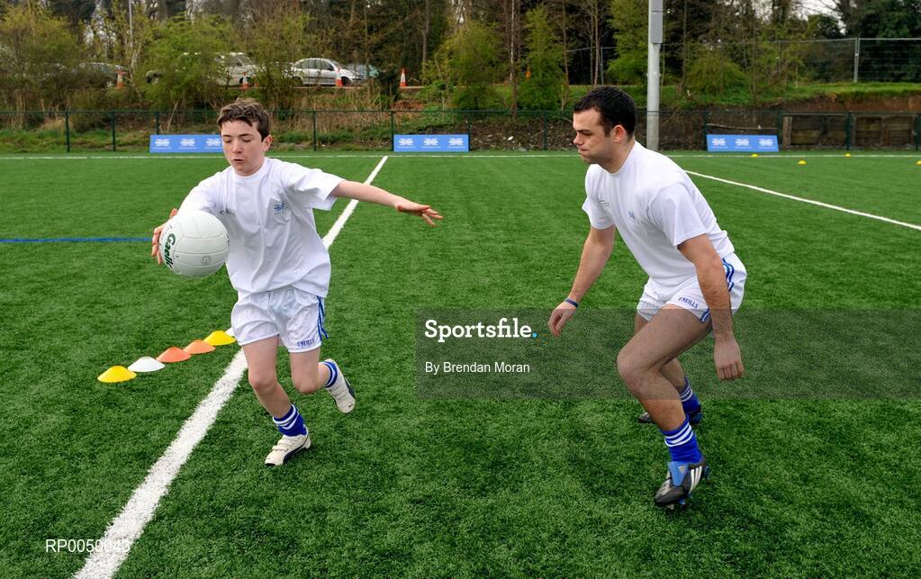 8 April 2008; Halifax has unveiled ten top inter-county stars as Brand Ambassadors to support the Halifax GaelicPerformance Summer Camps in 2008. The role of the ambassadors will include attending the camps and developing a specially designed Gaelic Skills training poster for children as well as other initiatives to be launched over the coming month. The ambassadors include Alan Kerins, Galway, Declan O'Sullivan, Kerry, Stephen Bray, Meath, Bernard Brogan, Dublin, Sean Cavanagh, Tyrone, James Masters, Cork, Alan Dillon, Mayo, Paul Casey, Dublin and Paul Finlay, Monaghan and Dublin ladies football captain Cliodhna O'Connor. Pictured is Ronan McDyer, from St Fintan's School, Sutton, Dublin, in action against Paul Casey, Dublin. University College Dublin, Belfield, Dublin. Picture credit: Brendan Moran / SPORTSFILE