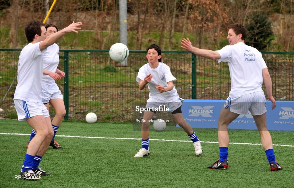 8 April 2008; Halifax has unveiled ten top inter-county stars as Brand Ambassadors to support the Halifax GaelicPerformance Summer Camps in 2008. The role of the ambassadors will include attending the camps and developing a specially designed Gaelic Skills training poster for children as well as other initiatives to be launched over the coming month. The ambassadors include Alan Kerins, Galway, Declan O'Sullivan, Kerry, Stephen Bray, Meath, Bernard Brogan, Dublin, Sean Cavanagh, Tyrone, James Masters, Cork, Alan Dillon, Mayo, Paul Casey, Dublin and Paul Finlay, Monaghan and Dublin ladies football captain Cliodhna O'Connor. Pictured is Eoghan Smyth, from St Fintan's School, Sutton, Dublin, in action against Alan Dillon, Mayo, left, and Stephen Bray, Meath. University College Dublin, Belfield, Dublin. Picture credit: Brendan Moran / SPORTSFILE