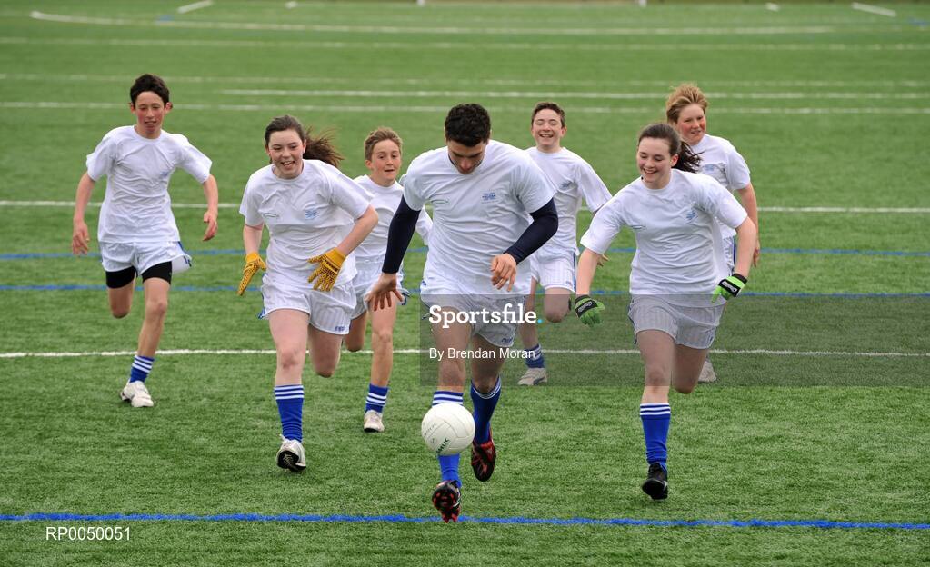 8 April 2008; Halifax has unveiled ten top inter-county stars as Brand Ambassadors to support the Halifax GaelicPerformance Summer Camps in 2008. The role of the ambassadors will include attending the camps and developing a specially designed Gaelic Skills training poster for children as well as other initiatives to be launched over the coming month. The ambassadors include Alan Kerins, Galway, Declan O'Sullivan, Kerry, Stephen Bray, Meath, Bernard Brogan, Dublin, Sean Cavanagh, Tyrone, James Masters, Cork, Alan Dillon, Mayo, Paul Casey, Dublin and Paul Finlay, Monaghan and Dublin ladies football captain Cliodhna O'Connor. Pictured is Bernard Brogan, Dublin, being chased by, from left, Eoghan Smyth, Hollie Minehan, Kevin Wade, Ronan McDyer, Emma McDonagh and Sean Brodie, all from St Fintan's School, Sutton, Dublin. University College Dublin, Belfield, Dublin. Picture credit: Brendan Moran / SPORTSFILE
