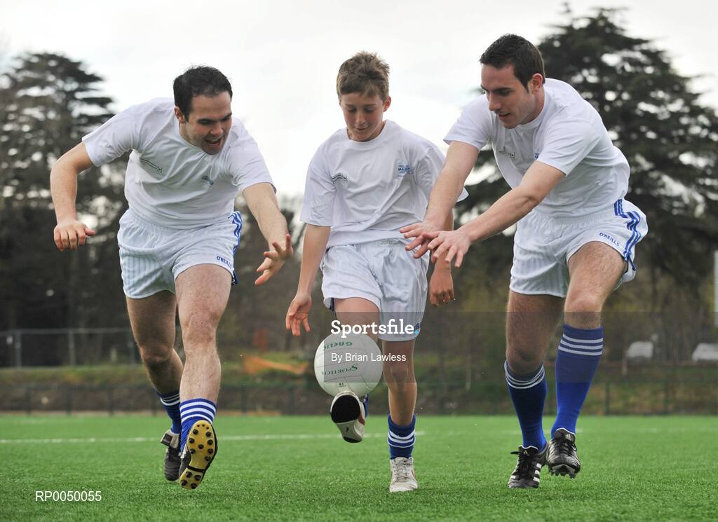 8 April 2008; Halifax has unveiled ten top inter-county stars as Brand Ambassadors to support the Halifax GaelicPerformance Summer Camps in 2008. The role of the ambassadors will include attending the camps and developing a specially designed Gaelic Skills training poster for children as well as other initiatives to be launched over the coming month. The ambassadors include Alan Kerins, Galway, Declan O'Sullivan, Kerry, Stephen Bray, Meath, Bernard Brogan, Dublin, Sean Cavanagh, Tyrone, James Masters, Cork, Alan Dillon, Mayo, Paul Casey, Dublin and Paul Finlay, Monaghan and Dublin ladies football captain Cliodhna O'Connor. Pictured is Kevin Wade, from St Fintan's School, Sutton, Dublin, in action against Paul Finlay, left, Monaghan and Declan O'Sullivan, Kerry. University College Dublin, Belfield, Dublin. Picture credit: Brian Lawless / SPORTSFILE