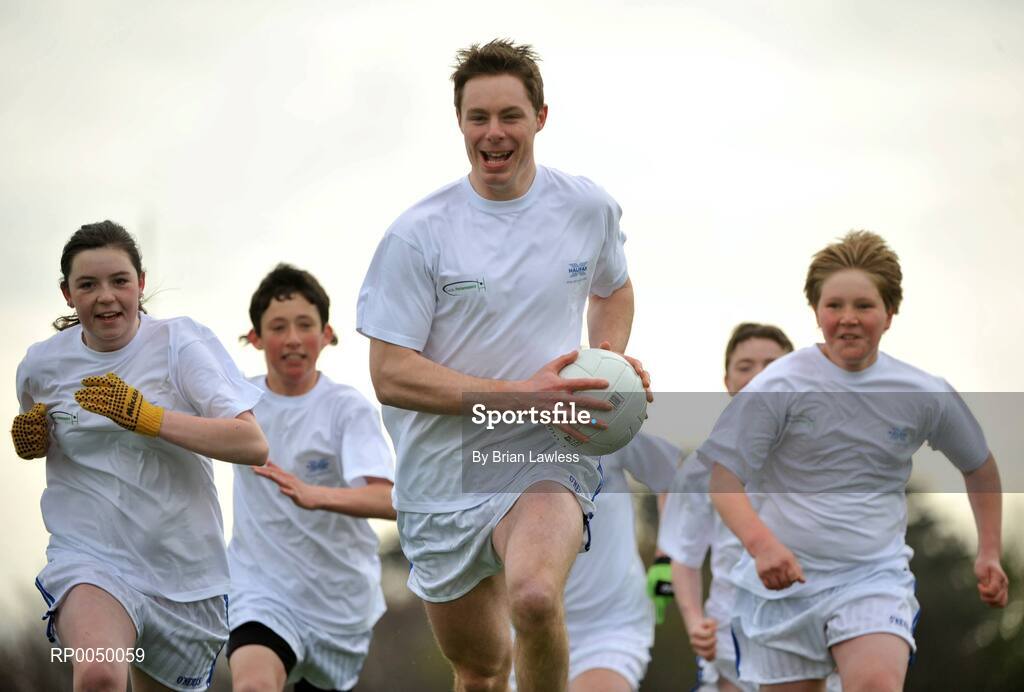 8 April 2008; Halifax has unveiled ten top inter-county stars as Brand Ambassadors to support the Halifax GaelicPerformance Summer Camps in 2008. The role of the ambassadors will include attending the camps and developing a specially designed Gaelic Skills training poster for children as well as other initiatives to be launched over the coming month. The ambassadors include Alan Kerins, Galway, Declan O'Sullivan, Kerry, Stephen Bray, Meath, Bernard Brogan, Dublin, Sean Cavanagh, Tyrone, James Masters, Cork, Alan Dillon, Mayo, Paul Casey, Dublin and Paul Finlay, Monaghan and Dublin ladies football captain Cliodhna O'Connor. Pictured is Stephen Bray, Meath, being chased by, from left, Hollie Minehan, Eoghan Smyth and Sean Brodie, all from St Fintan's School, Sutton, Dublin. University College Dublin, Belfield, Dublin. Picture credit: Brian Lawless / SPORTSFILE