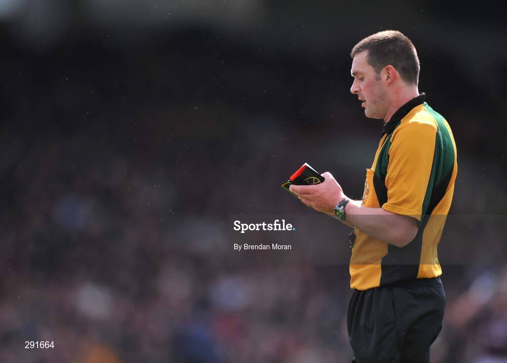 13 April 2008; Referee James Owens takes the name of a player in his book. Allianz National Hurling League, Division 1, semi-final, Cork v Galway, Gaelic Grounds, Limerick. Picture credit: Brendan Moran / SPORTSFILE
