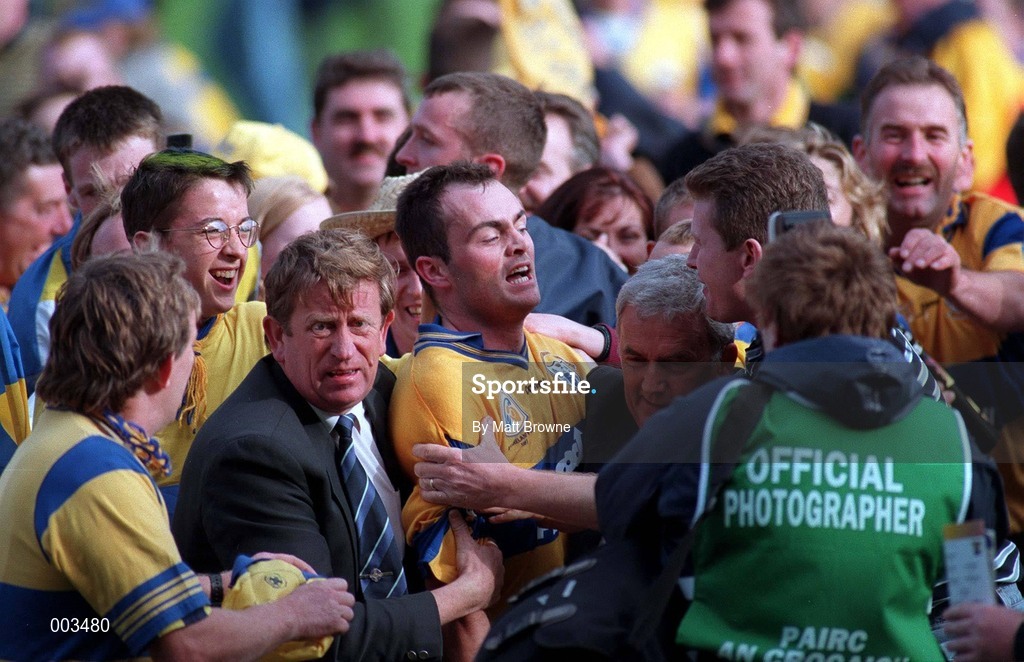 14 September 1997; Anthony Daly of Clare celebrates with supporters after the Guinness All Ireland Hurling Final match between Clare and Tipperary at Croke Park in Dublin. Photo by Matt Browne/Sportsfile