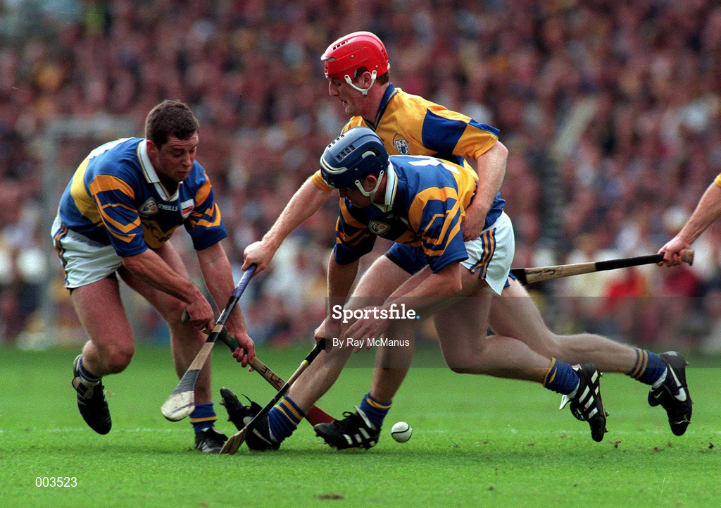 14 September 1997; Liam McGrath, left, and Eugene O'Neill of Tipperary in action against Brian Lohan of Clare during the Guinness All-Ireland Senior Hurling Championship Final between Clare and Tipperary at Croke Park in Dublin. Photo by Ray McManus/Sportsfile