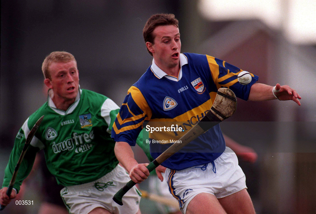 13 April 1997; Brian O'Meara of Tipperary in action against Dave Clarke of Limerick during the National Hurling League Division 1 match between Limerick v Tipperary at the Gaelic Grounds in Limerick. Photo by Brendan Moran/Sportsfile