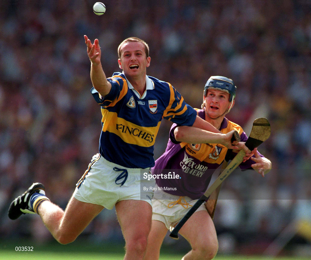 17 August 1997; Brian O'Meara of Tipperary in action against Colm Kehoe of Wexford during the GAA All-Ireland Senior Hurling Championship Semi-Final match between Tipperary and Wexford at Croke Park in Dublin. Photo by Ray McManus/Sportsfile