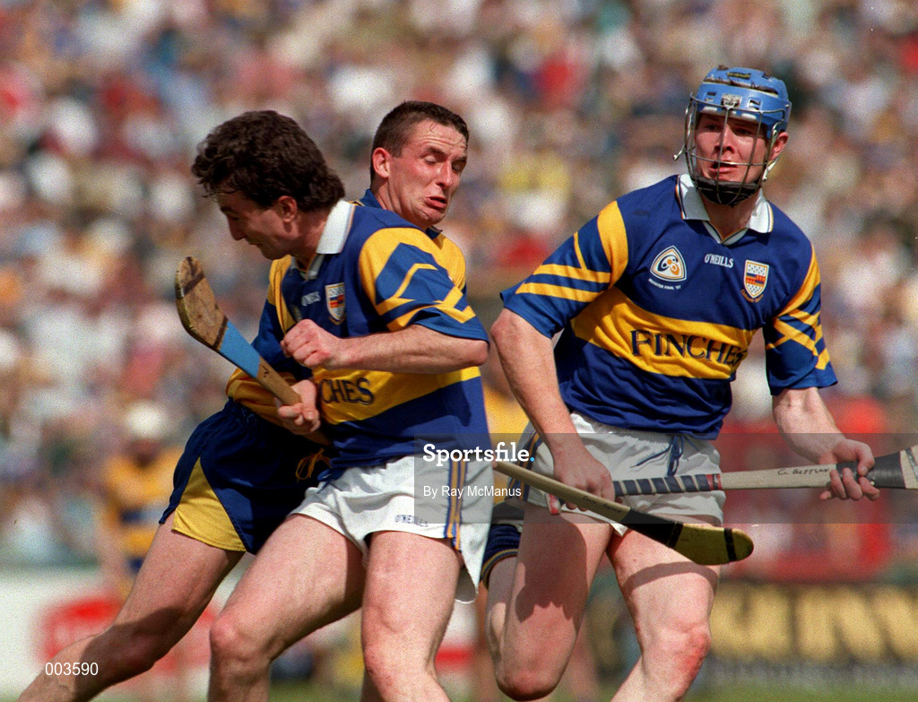 14 September 1997; Colin Lynch of Clare in action against Michael Ryan and Conor Gleeson of Tipperary during the GAA Munster Senior Hurling Championship Final match between Clare and Tipperary at Páirc Uí Chaoimh, Cork. Photo by Ray McManus/Sportsfile *** Local Caption ***