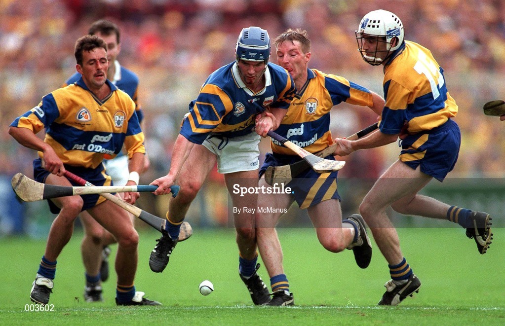 14 September 1997; Conal Bonnar of Tipperary in action against P.J O'Connell, James O'Connor and Ger O'Loughlin of Clare during the Guinness All Ireland Hurling Final match between Clare and Tipperary at Croke Park in Dublin. Photo by Ray McManus/Sportsfile