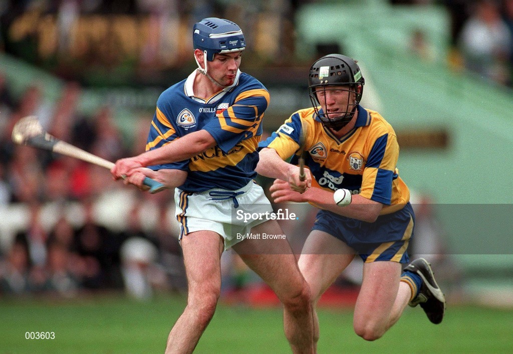 14 September 1997; Conal Bonnar of Tipperary in action against Niall Gilligan of Clare during the Guinness All Ireland Hurling Final match between Clare and Tipperary at Croke Park in Dublin. Photo by Matt Browne/Sportsfile