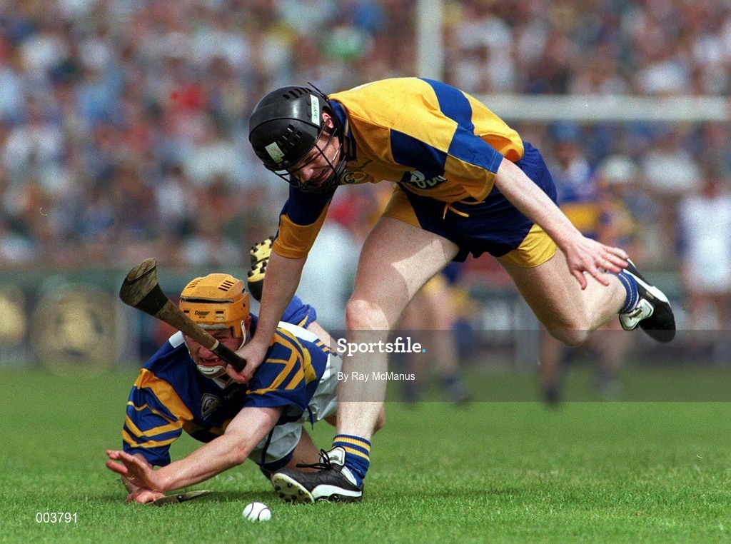 14 September 1997; Frank Lohan of Clare in action against Liam Cahill of Tipperary during the GAA Munster Senior Hurling Championship Final match between Clare and Tipperary at Páirc Uí Chaoimh, Cork. Photo by Ray McManus/Sportsfile