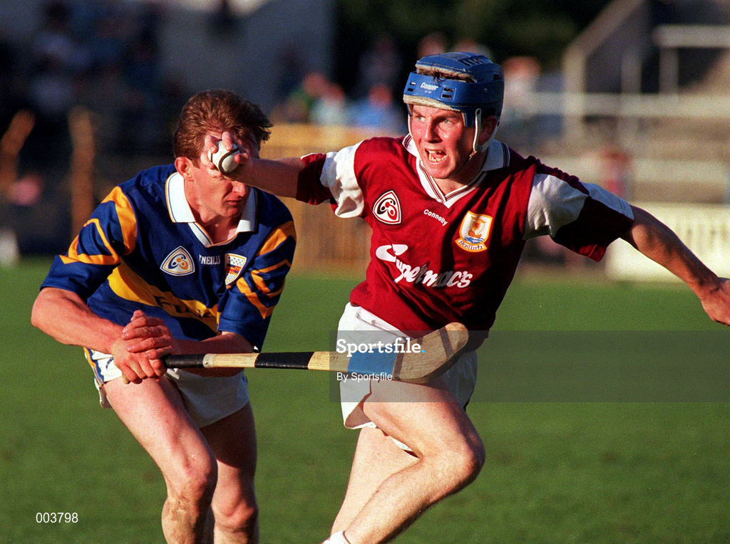 28 August 1997; Kevin Broderick of Galway in action against George Frend of Tipperary during the Church & General National Hurling League Semi-Final match between Galway and Tipperary at Cusack Park in Ennis, Clare. Photo by Sportsfile