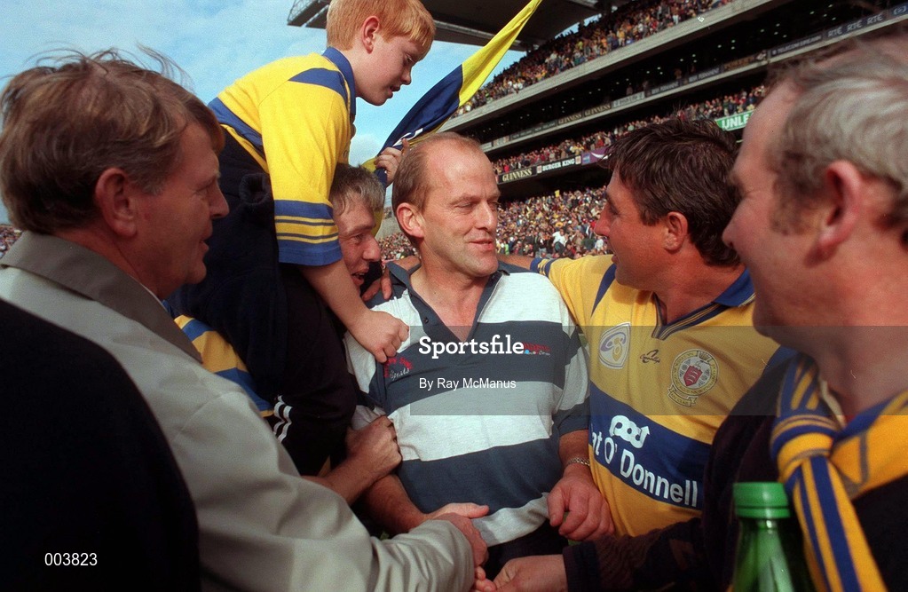 14 September 1997; Clare manager Ger Loughnane celebrates with supporters after the Guinness All Ireland Hurling Final match between Clare and Tipperary at Croke Park in Dublin. Photo by Ray McManus/Sportsfile