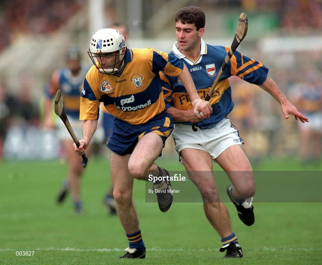 14 September 1997; Ollie Baker of Clare in action against Liam Sheedy of Tipperary during the Guinness All Ireland Hurling Final match between Clare and Tipperary at Croke Park in Dublin. Photo by David Maher/Sportsfile