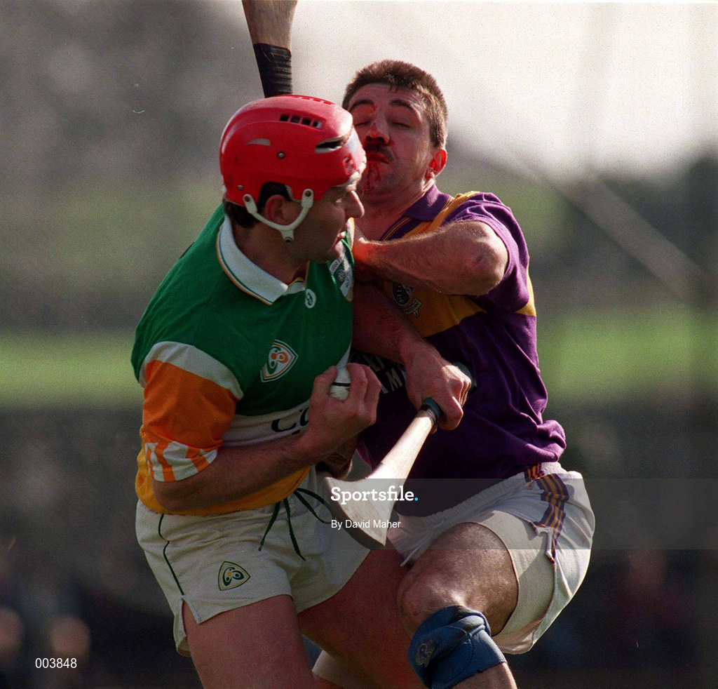 23 March 1997; Hubert Rigney of Offaly in action against Martin Storey of Wexford during the National Hurling League Division 1 match between Offaly and Wexford at St. Brendan's Park in Birr, Offaly. Photo by David Maher/Sportsfile