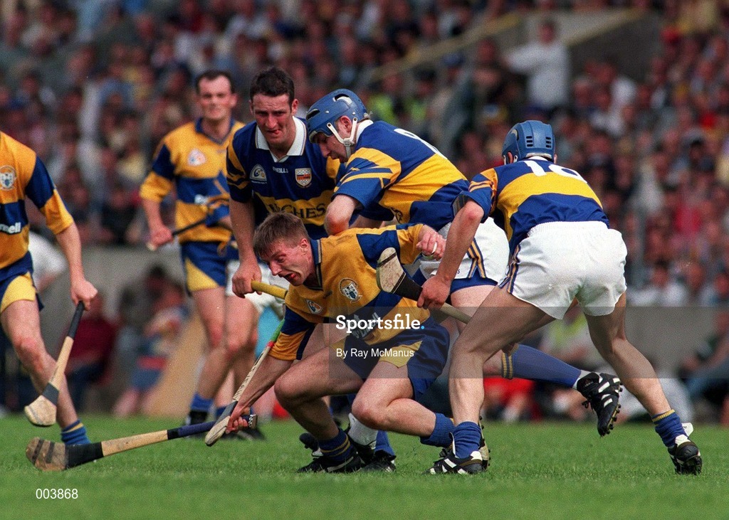 14 September 1997; Jamisie O'Connor of Clare  in action against John Leahy, Aiden Butler, Conal Bonnar of Tipperary during the GAA Munster Senior Hurling Championship Final match between Clare and Tipperary at Páirc Uí Chaoimh, Cork. Photo by Ray McManus/Sportsfile