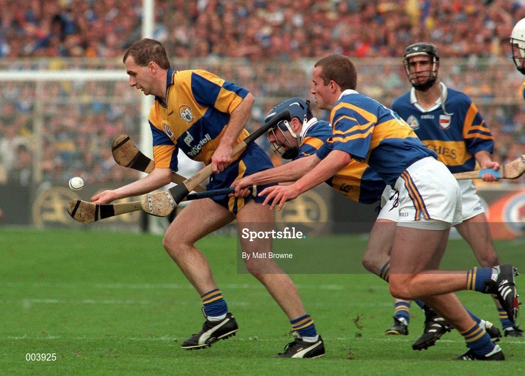 14 September 1997; Liam Doyle of Clare in action against John Leahy and Brian O'Meara of Tipperary during the Guinness All Ireland Hurling Final match between Clare and Tipperary at Croke Park in Dublin. Photo by Matt Browne/Sportsfile