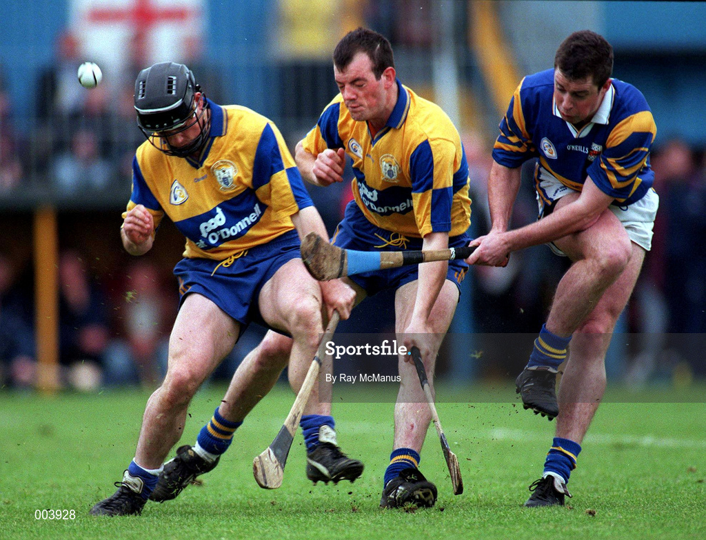 10 May 1997; Liam McGrath of Tipperary in action against Frank Lohan, left, and Ollie Baker of Clare during the National Hurling League Division 1 match between Clare and Tipperary at Cusack Park in Ennis. Photo by Ray McManus/Sportsfile