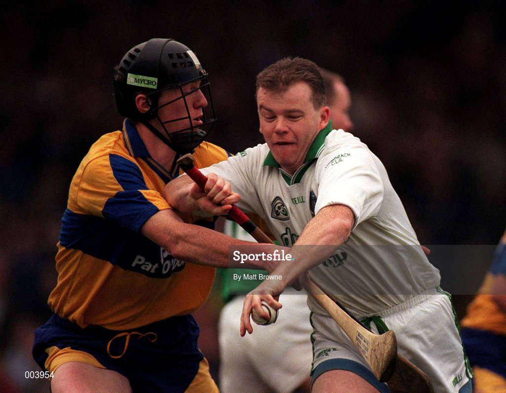 22 March 1998; Joe Quaid of Limerick in action against Niall Gilligan of Clare during the Church & General National Hurling League Division 1A match between Limerick and Clare at the Gaelic Grounds in Limerick. Photo by Matt Browne/Sportsfile