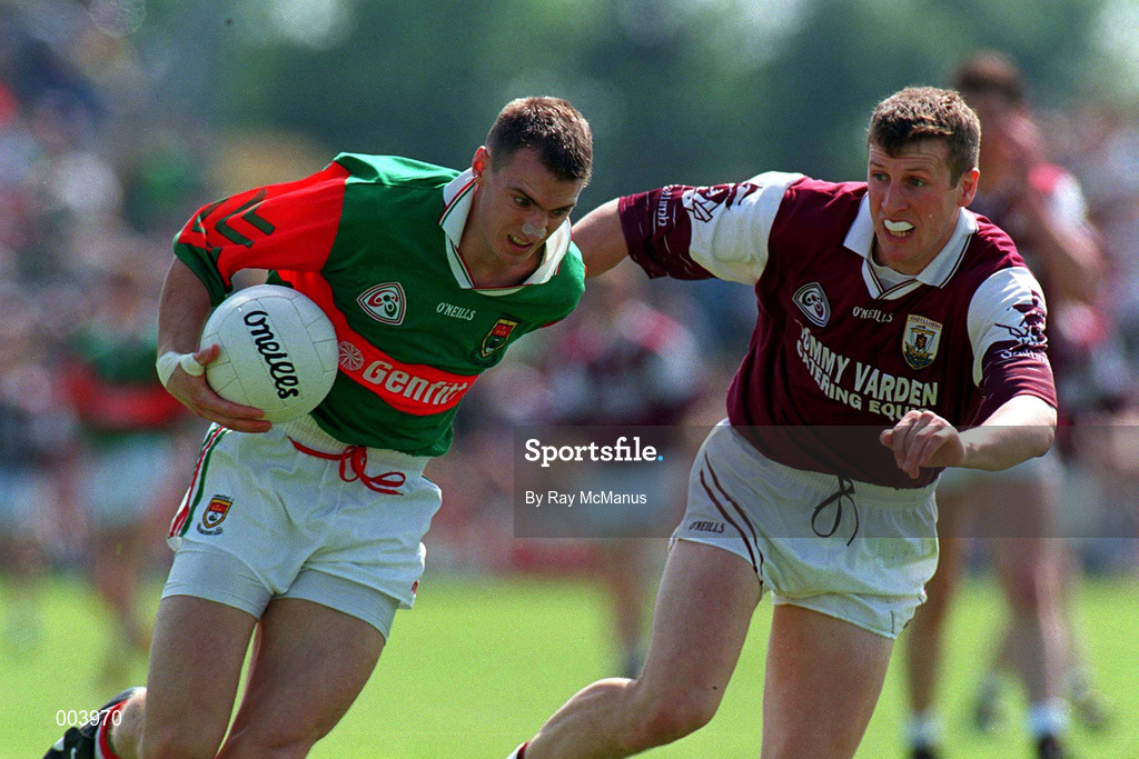 25 May 1997; John Casey of Mayo in action against Gary Fahey of Galway during the GAA Football Senior Championship Quarter-Final match between Galway and Mayo at Tuam Stadium in Tuam, Galway. Photo by Ray McManus/Sportsfile