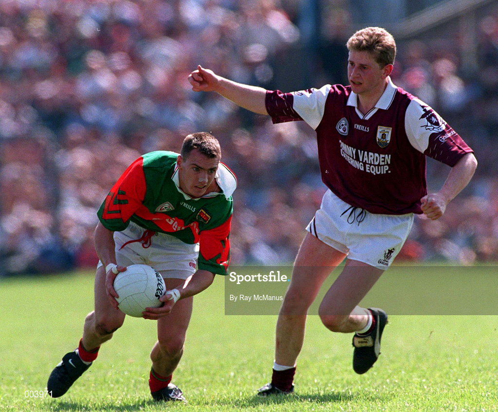 25 May 1997; John Casey of Mayo in action against Damien Mitchell of Galway during the GAA Football Senior Championship Quarter-Final match between Galway and Mayo at Tuam Stadium in Tuam, Galway. Photo by Ray McManus/Sportsfile