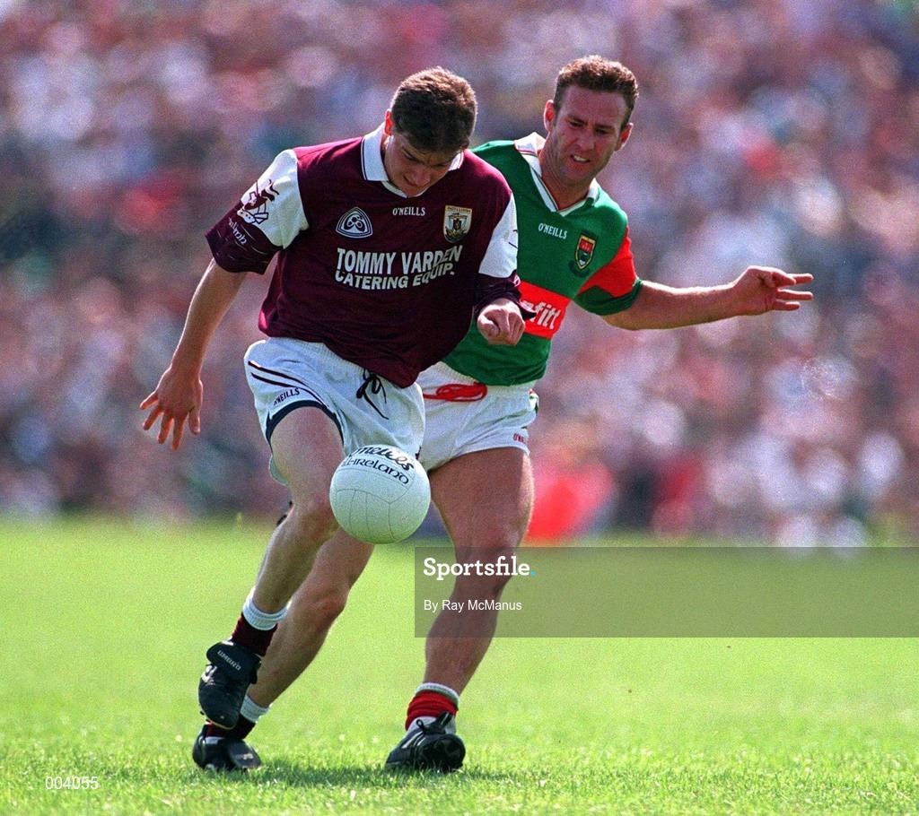 25 May 1997; Michael Donnelan of Galway in action against Colm McMenamon Mayo during the GAA Football Senior Championship Quarter-Final match between Galway and Mayo at Tuam Stadium in Tuam, Galway. Photo by Ray McManus/Sportsfile