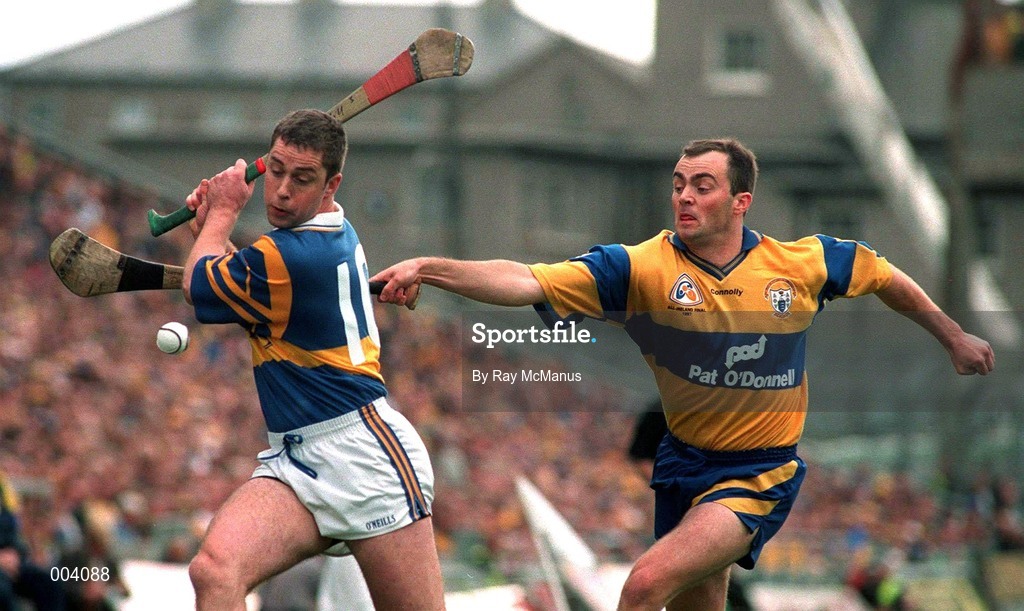 14 September 1997; Liam McGrath of Tipperary in action against Anthony Daly of Clare during the Guinness All Ireland Hurling Final match between Clare and Tipperary at Croke Park in Dublin. Photo by Ray McManus/Sportsfile