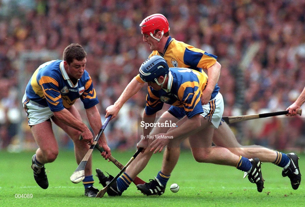 14 September 1997; Liam McGrath, left, and Eugene O'Neill of Tipperary in action against Brian Lohan of Clare during the Guinness All Ireland Hurling Final match between Clare and Tipperary at Croke Park in Dublin. Photo by Ray McManus/Sportsfile